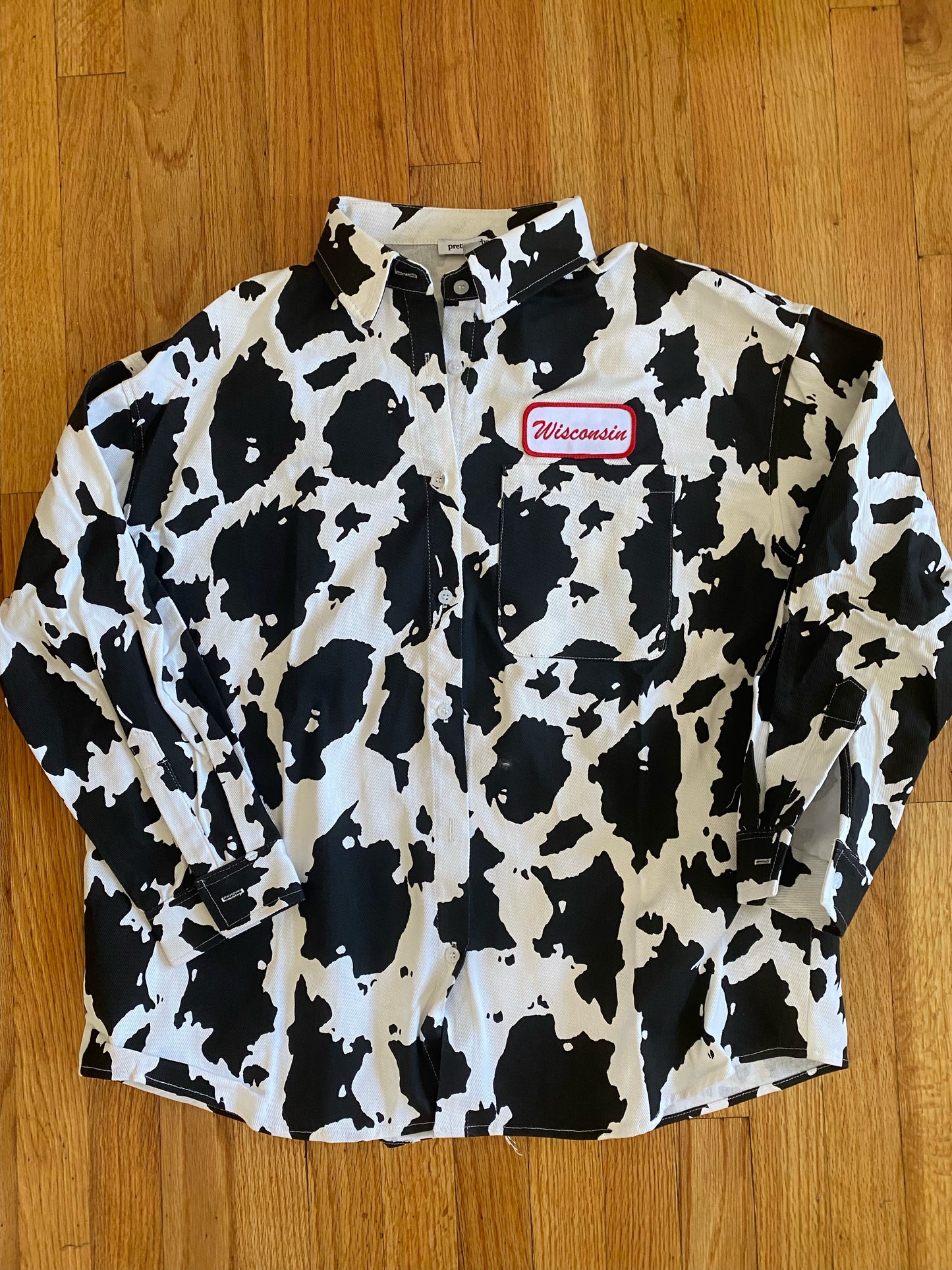 Wisconsin Name Plate Cow Print Shacket